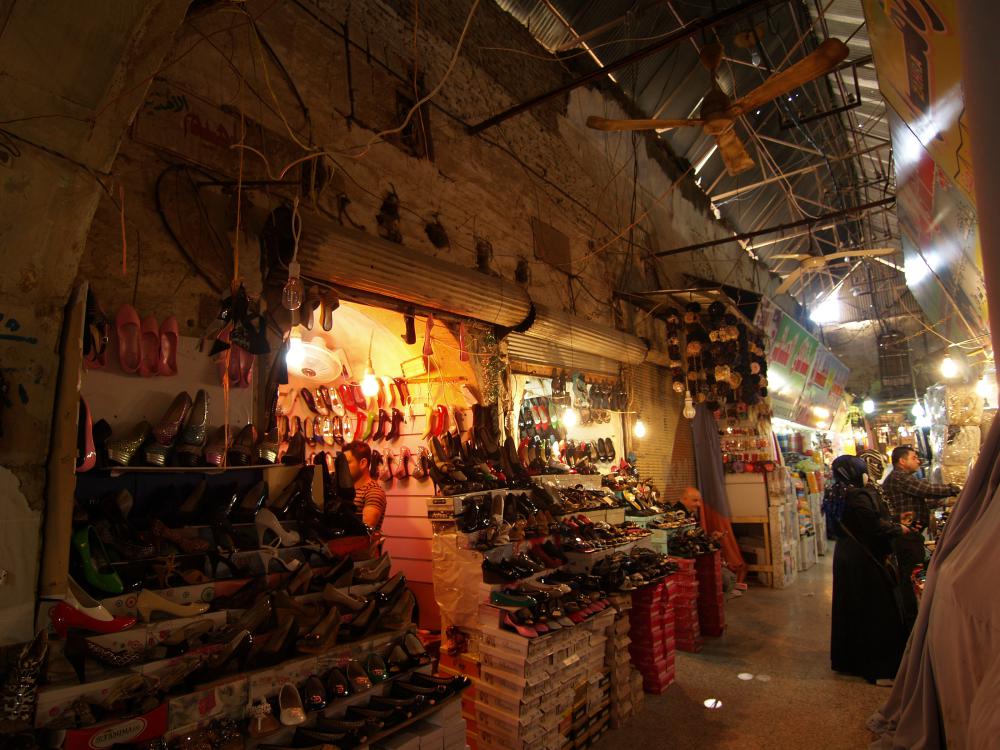 Western Qaisirya in Erbil. Bazaar walkways with temporary metal roofing.