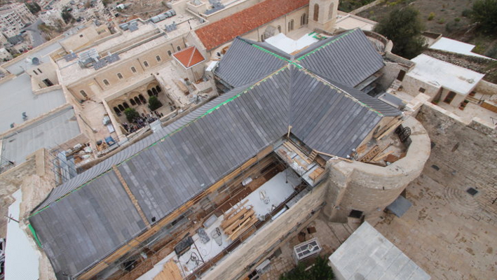 Restoration of the badly damaged roof of the Church of the Nativity.