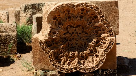 Carved rosettes on the palace facade.